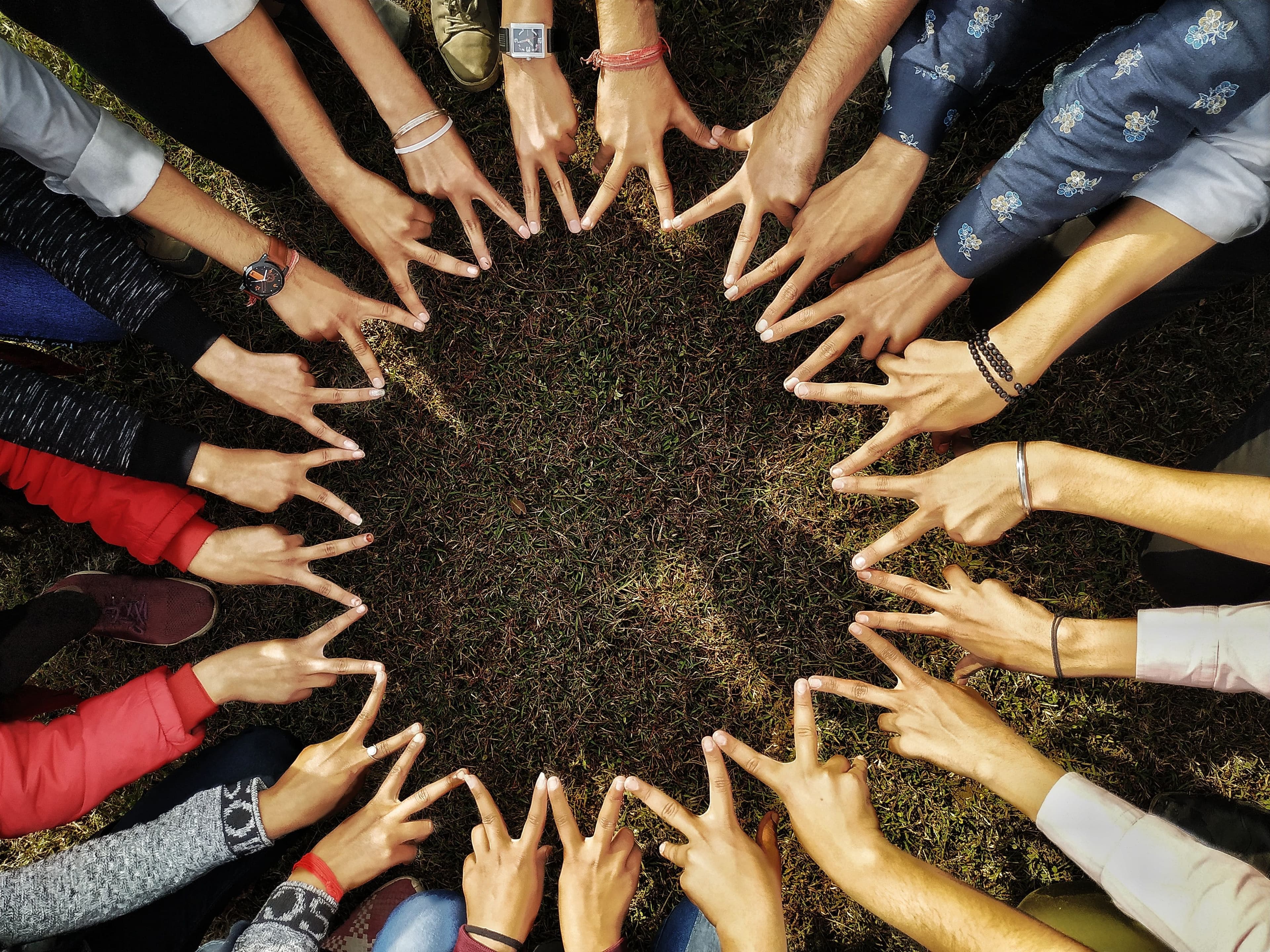 Hands forming a circle — community in unity